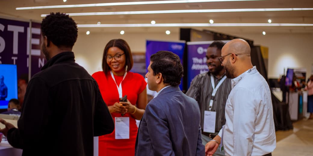 Attendees networking on the floor at Africa Technology Expo in Lagos. Credit: CloudsaAfrica / x.com.