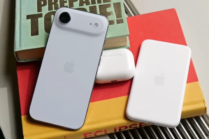An iPhone Air next to Apple battery accessories. Credit: Sam Rutherford.
