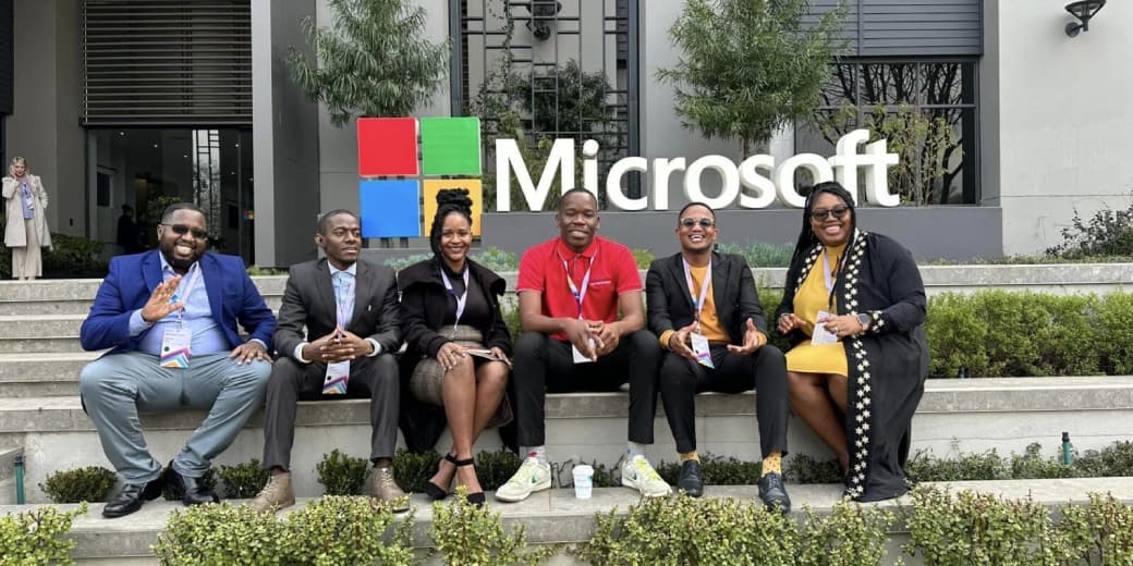 People seated outside a Microsoft South Africa office. Credit: Microsoft South Africa.