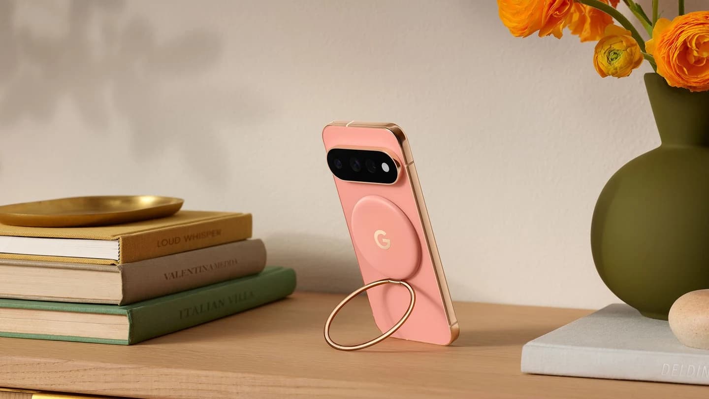 Canyon Pixel 11 Pro attached magnetically to a Google Pixelsnap Ring Stand on a desk.