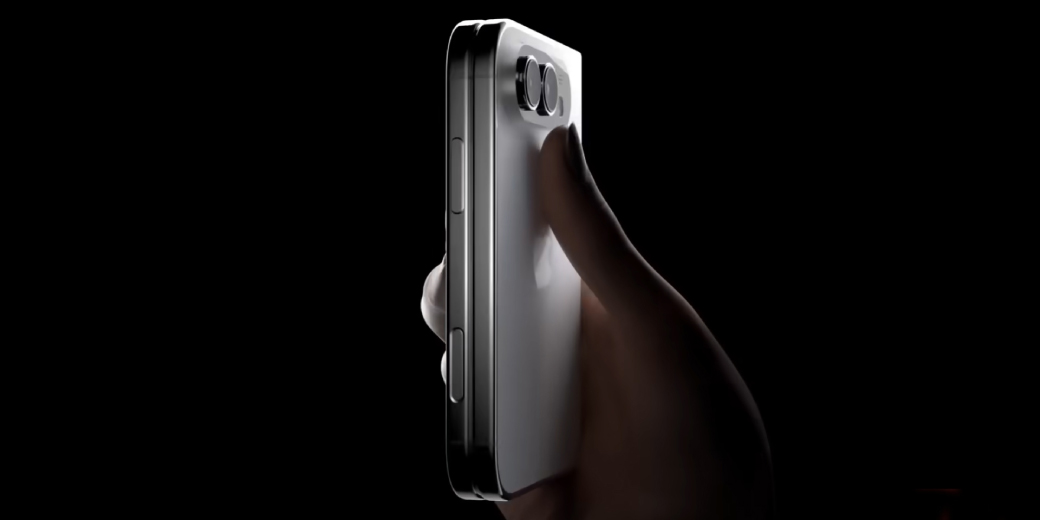 A foldable iPhone concept being held in low light. Credit: Geeky Gadgets.
